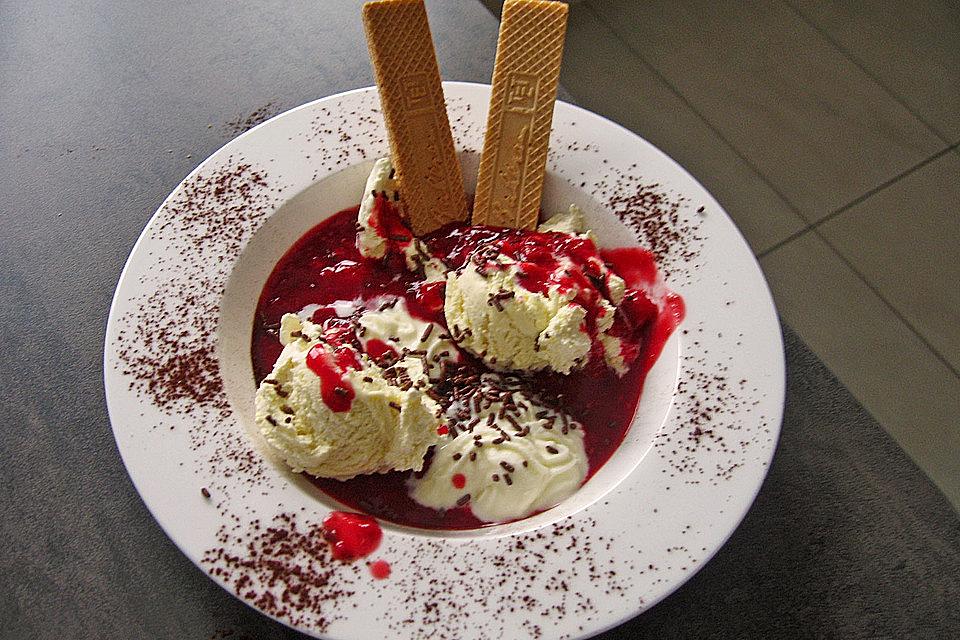 hot raspberries with vanilla ice cream